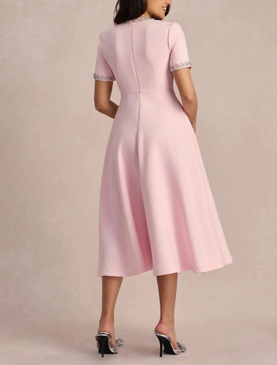 Raffaella | Flared Dress with Bows and Beads