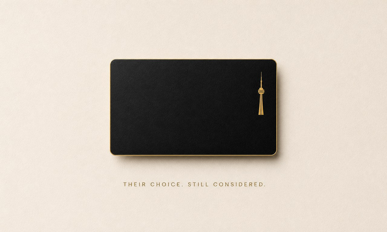 Black La Belle Toronto gift card with a gold CN Tower mark
